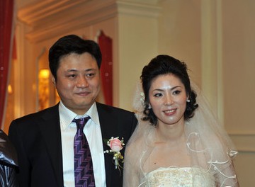 亚洲女飞人步入婚姻殿堂李雪梅携夫传爱情接力棒